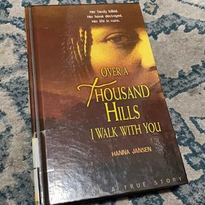Over a thousand hills i walk with you by Hanna Jansen
